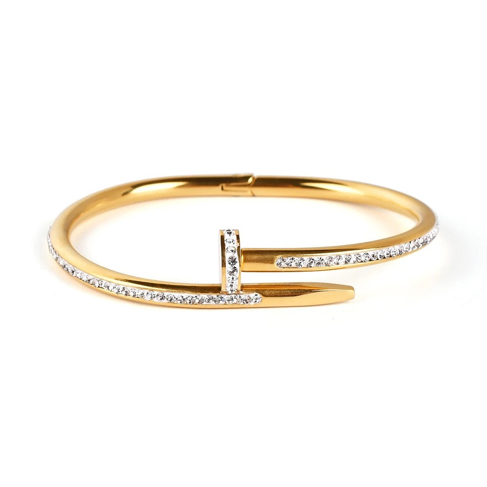 Studded nail handcuff
