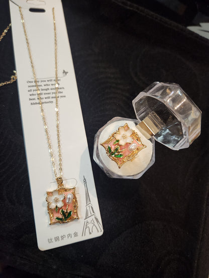 Floral and pearl frame pendant and ring