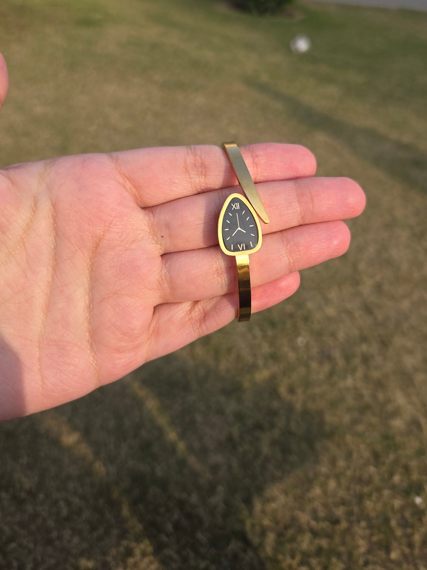 Elegant gold watch style bracelet