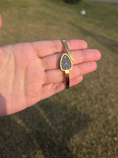 Elegant gold watch style bracelet