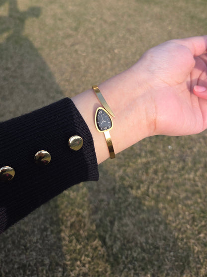 Elegant gold watch style bracelet