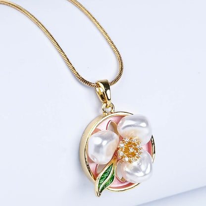 Pearl floral pendant and ring