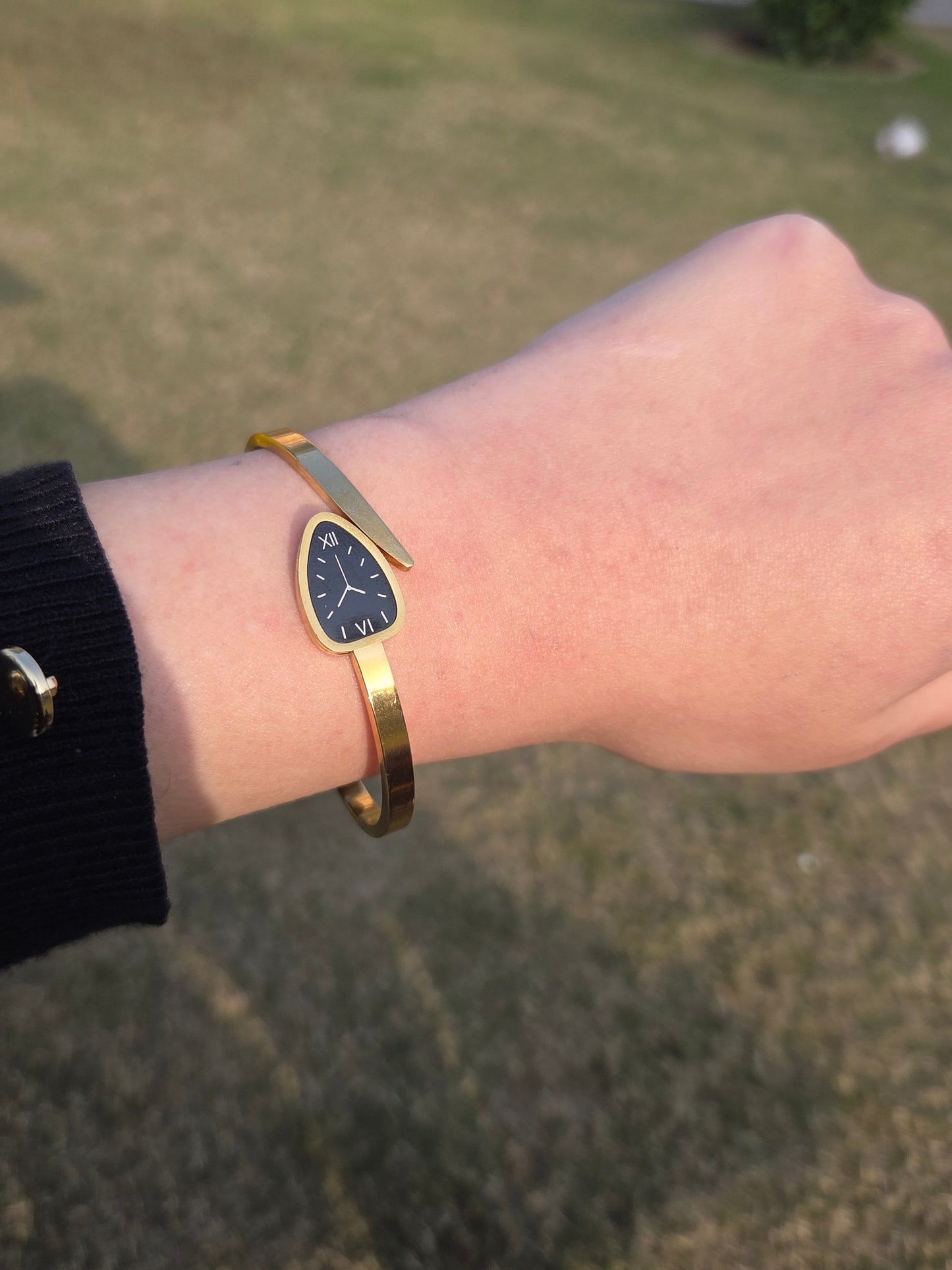 Elegant gold watch style bracelet