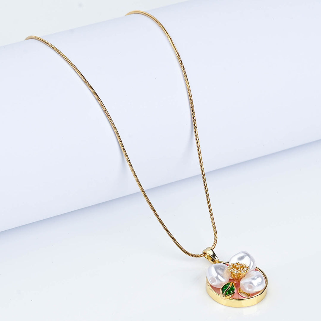 Pearl floral pendant and ring