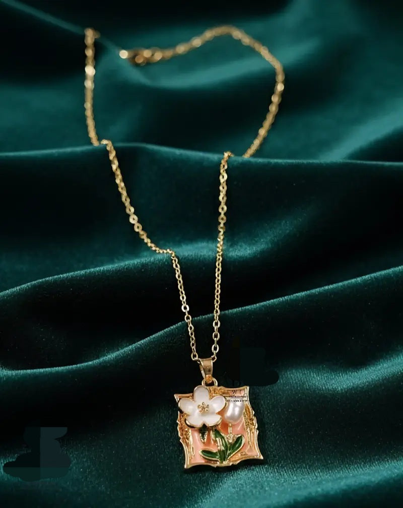 Floral and pearl frame pendant and ring