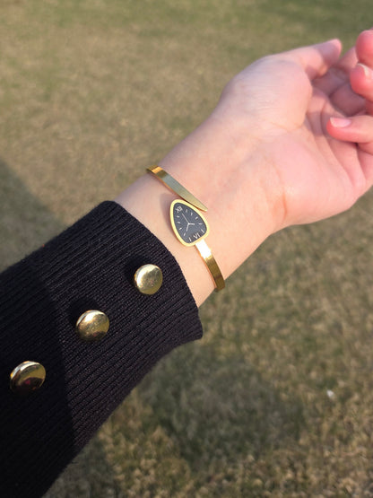 Elegant gold watch style bracelet