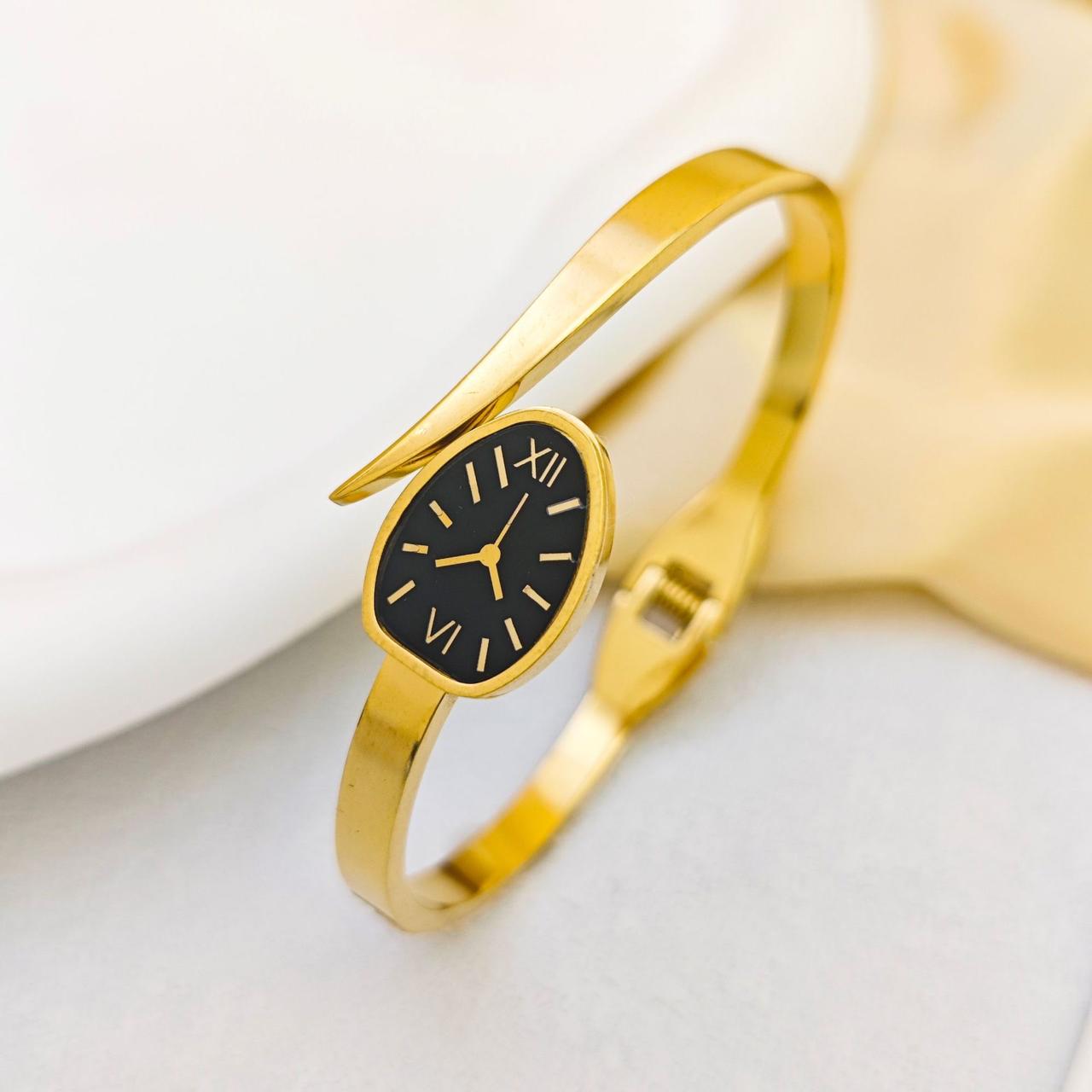 Elegant gold watch style bracelet