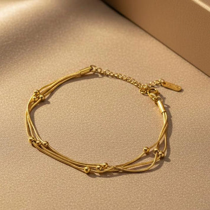 Triple chain ball bracelet